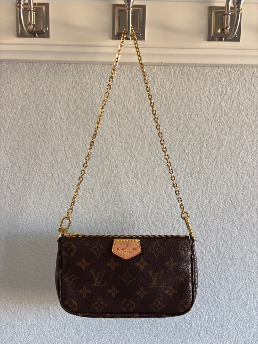 Louis Vuitton Monogram Mini Pochette in Brown with Gold Chain